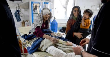 An injured Afghan woman receives treatment at a hospital in the aftermath of an earthquake, in Mazar-i-Sharif, Afghanistan, Nov. 3, 2025. (AFP Photo)