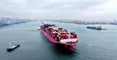 A container ship sails from a port, Qingdao, China, Oct. 11, 2025. (AFP Photo)