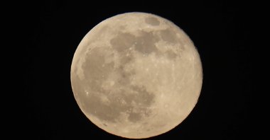 The supermoon shines over Sanaa, Yemen, Oct. 7, 2025. (EPA Photo)