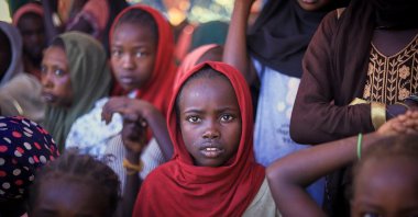 This photo released by The Norwegian Refugee Council (NRC), shows displaced women and children from el-Fasher at a camp where they sought refuge from fighting between government forces and the RSF, in Tawila, Darfur region, Sudan, Nov. 3, 2025. (AP Photo)