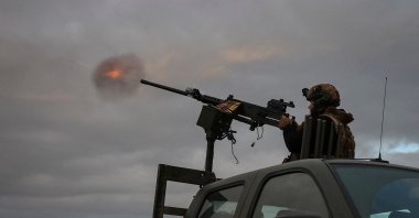 A serviceman from an anti-drone mobile air defence unit of the 38th Separate Marine Brigade of the Ukrainian Armed Forces fires a M2 Browning machine gun during combat shift on the front line, amid Russia&#039;s attack on Ukraine, in the Donetsk region, Ukraine, Oct. 20, 2025. (Reuters Photo)