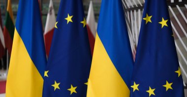 European Union and Ukrainian flags are seen in this undated photo. (Shutterstock File Photo)