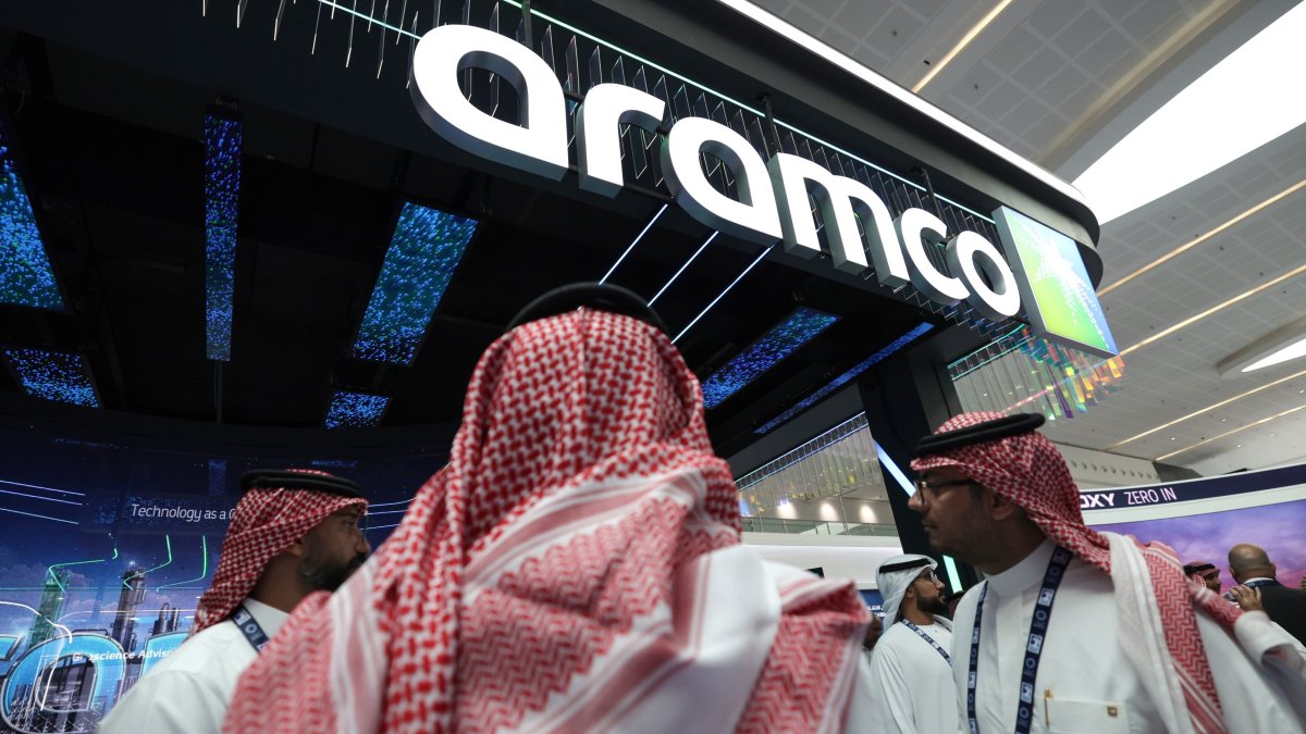 Visitors gather at the Aramco stand during an event in Abu Dhabi, UAE, Nov. 3, 2025. (EPA Photo)
