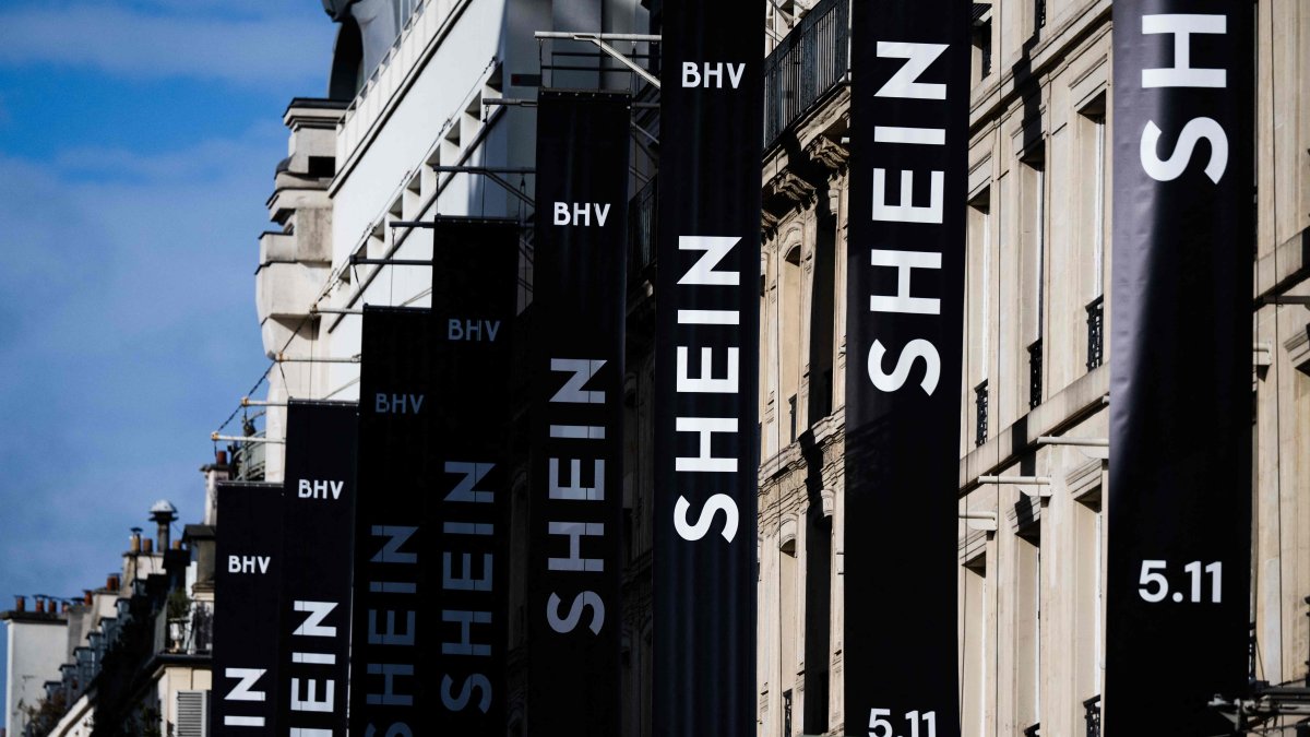 This photograph shows the logo of Asian e-commerce giant Shein on the facade of the Bazar de l&#039;Hotel de Ville (BHV) department store in Paris, Nov. 3, 2025. (AFP Photo)