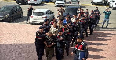 Security officers escort FETÖ suspects captured while trying to flee to Greece, Muğla, southwestern Türkiye, Nov. 1, 2025. (DHA Photo)