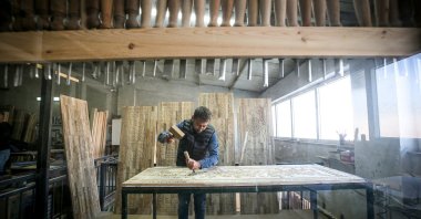 Turkish carpenter Fahri Kaptan engraves wood into artworks, Bursa, Türkiye, Oct. 14, 2025. (AA Photo)