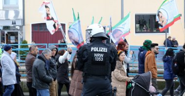 A police officer secures a demonstration of PKK terrorist sympathizers demanding the release of the PKK&#039;s imprisoned ringleader Abdullah Öcalan, Cologne, Germany, Feb. 17, 2024. (Reuters Photo)