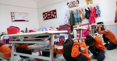 Students participate in an earthquake preparedness drill at a school, as part of nationwide disaster awareness programs, Istanbul, Türkiye, Oct. 23, 2025. (AA Photo)