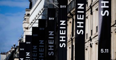 This photograph shows the logo of Asian e-commerce giant Shein on the facade of the Bazar de l&#039;Hotel de Ville (BHV) department store in Paris, Nov. 3, 2025. (AFP Photo)