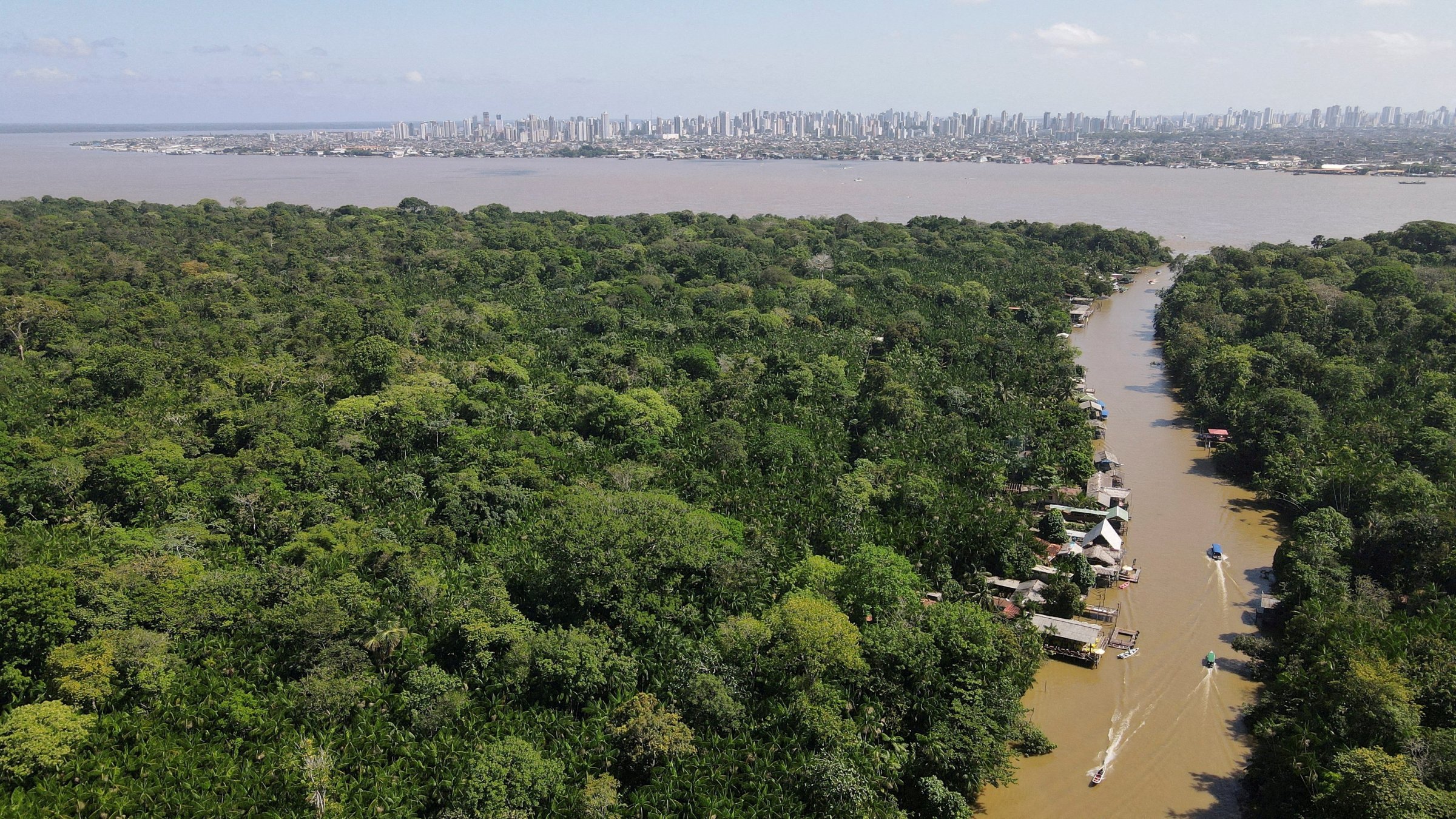 A drone image shows the Amazon rainforest and the city of Belem in the back ahead of COP 30, at Ilha do Combu, in Belem, Para state, Brazil, Aug. 10, 2025. (Reuters Photo)