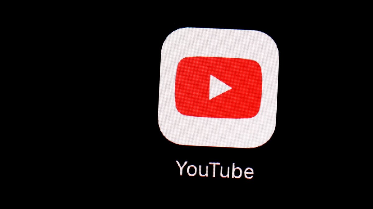 The YouTube app logo is seen on an iPad screen, March 20, 2018. (AP Photo)