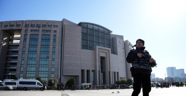 A police officer stands guard outside the Çağlayan courthouse, Istanbul, Türkiye, Feb. 6, 2024. (IHA File Photo)