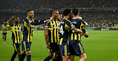 Fenerbahçe players celebrate after Kerem Aktürkoğlu scores his team&#039;s first goal in a penalty shot during the UEFA Europa League league phase match against Stuttgart at the Chobani Stadium, Istanbul, Türkiye, Oct. 23, 2025. (AFP Photo)