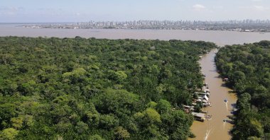 A drone image shows the Amazon rainforest and the city of Belem in the back ahead of COP 30, at Ilha do Combu, in Belem, Para state, Brazil, Aug. 10, 2025. (Reuters Photo)