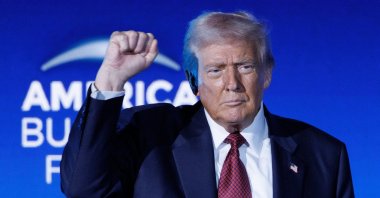 U.S. President Donald Trump reacts at the inaugural US edition of the America Business Forum at the Kaseya Center in Miami, Florida, U.S., Nov. 5, 2025. (EPA Photo)