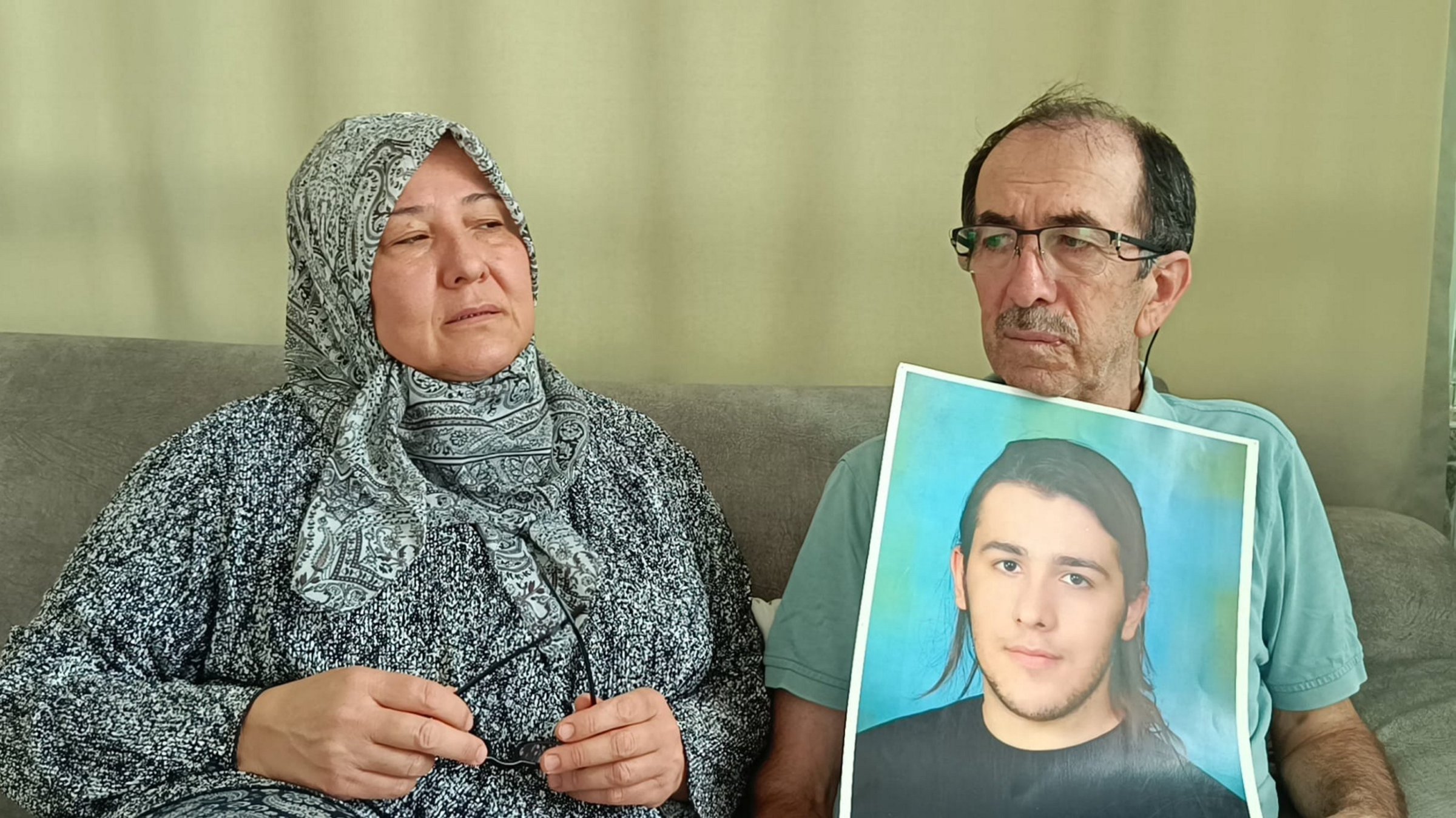 Zuhal Dölek (L) and Hasan Dölek, parents of Furkan Dölek, wait for news of their son in Kozan, Adana, Türkiye, Sept. 2, 2025. (AA Photo)
