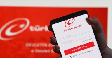 The homepage of Türkiye’s e-Government Gateway is displayed on a phone screen, showing the user login interface, Istanbul, Türkiye, April 6, 2020. (Shutterstock Photo)