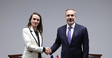 Romanian Foreign Minister Oana Toiu shakes hands with Foreign Minister Hakan Fidan, Luxembourg City, Luxembourg, Oct. 20, 2025. (AA Photo)