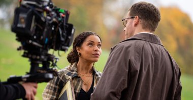 Antonia Thomas (L) and Josh Dylan appear on the set of the Agatha Christie series &quot;Tommy &amp; Tuppence&quot; in Beaconsfield, U.K., Oct. 29, 2025. (AP Photo)