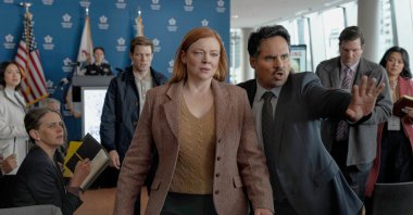 This image released by Peacock shows Sarah Snook (C) and Michael Peña (R) in a scene from &quot;All Her Fault.&quot; (AP Photo)