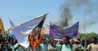 Sudanese Students from local schools shout slogans as they take part in an organized march during a protest against violations committed by the Rapid Support Forces (RSF) against the people of El-Fasher, Gedaref city, Sudan, Nov. 6, 2025. (AFP Photo)