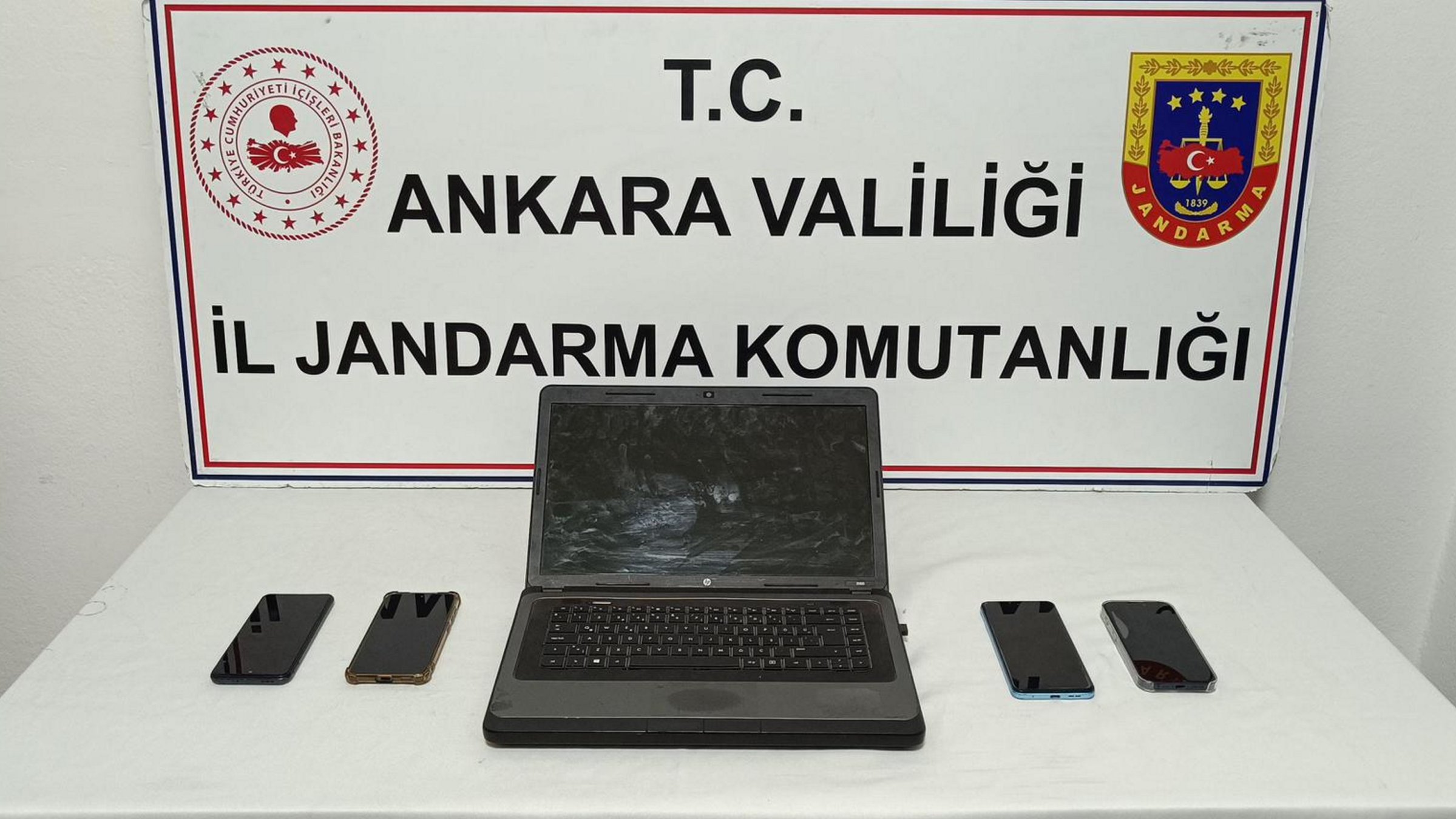 Digital devices seized during the cyber espionage operation are displayed at the Gendarmerie General Command in Ankara, Türkiye, Nov. 8, 2025. (AA Photo)