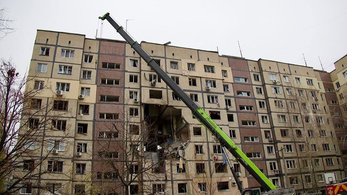 Ukrainian rescuers work at the site of a heavily damaged residential building following a Russian air attack in Dnipro, Ukraine, Nov. 8, 2025 (AFP Photo) 