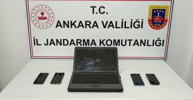 Digital devices seized during the cyber espionage operation are displayed at the Gendarmerie General Command in Ankara, Türkiye, Nov. 8, 2025. (AA Photo)