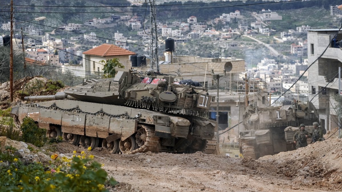 This file photo shows Israeli tanks deployed during an army operation in the occupied West Bank, Palestine, Feb. 24, 2025. (AP Photo)