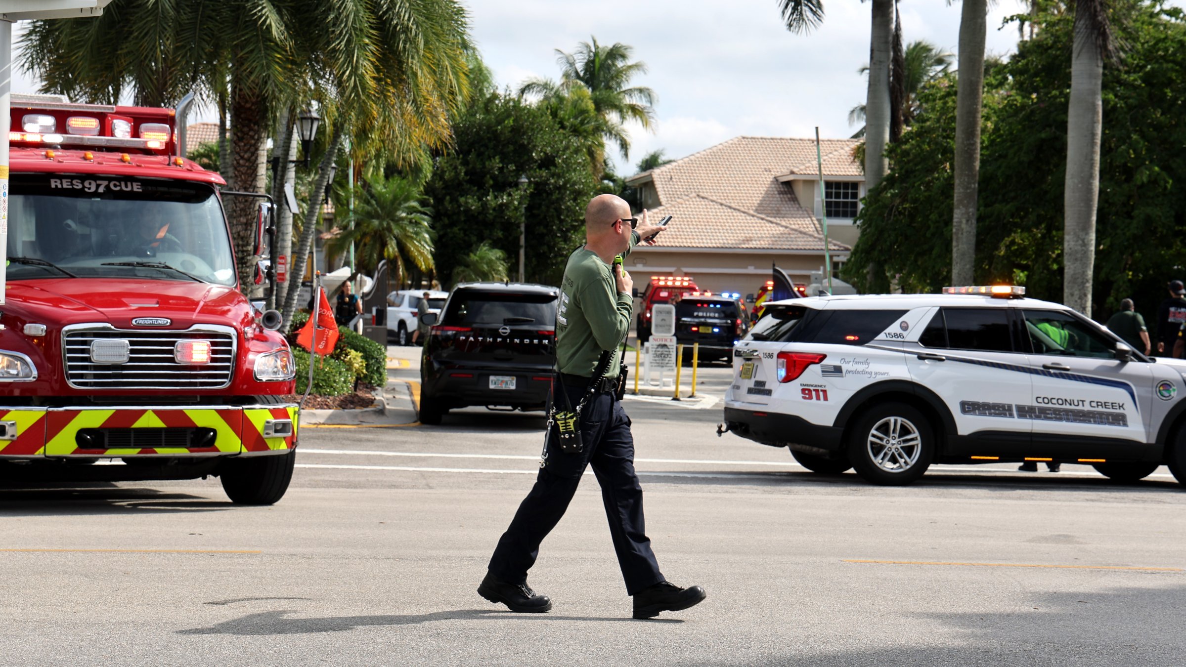 Emergency personnel from Coral Springs and Coconut Creek are on scene where a plane crashed in the Windsor Bay community in Coral Springs, Monday, Nov. 10, 2025. (Carline Jean/South Florida Sun-Sentinel via AP)