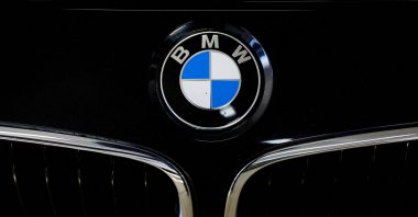 A logo of BMW is seen inside a car dealer in Nijmegen, Netherlands, Feb. 26, 2025. (Reuters Photo)