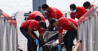Police officers carry the body of a victim after a boat carrying members of Myanmar&#039;s persecuted Rohingya community sank in waters near the Thailand-Malaysia border, Langkawi, Malaysia, Nov. 10, 2025. (Reuters Photo)