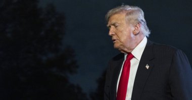 U.S. President Donald Trump walks toward the residence after stepping off Marine One on the South Lawn of the White House in Washington, U.S., Nov. 9, 2025. (EPA Photo)