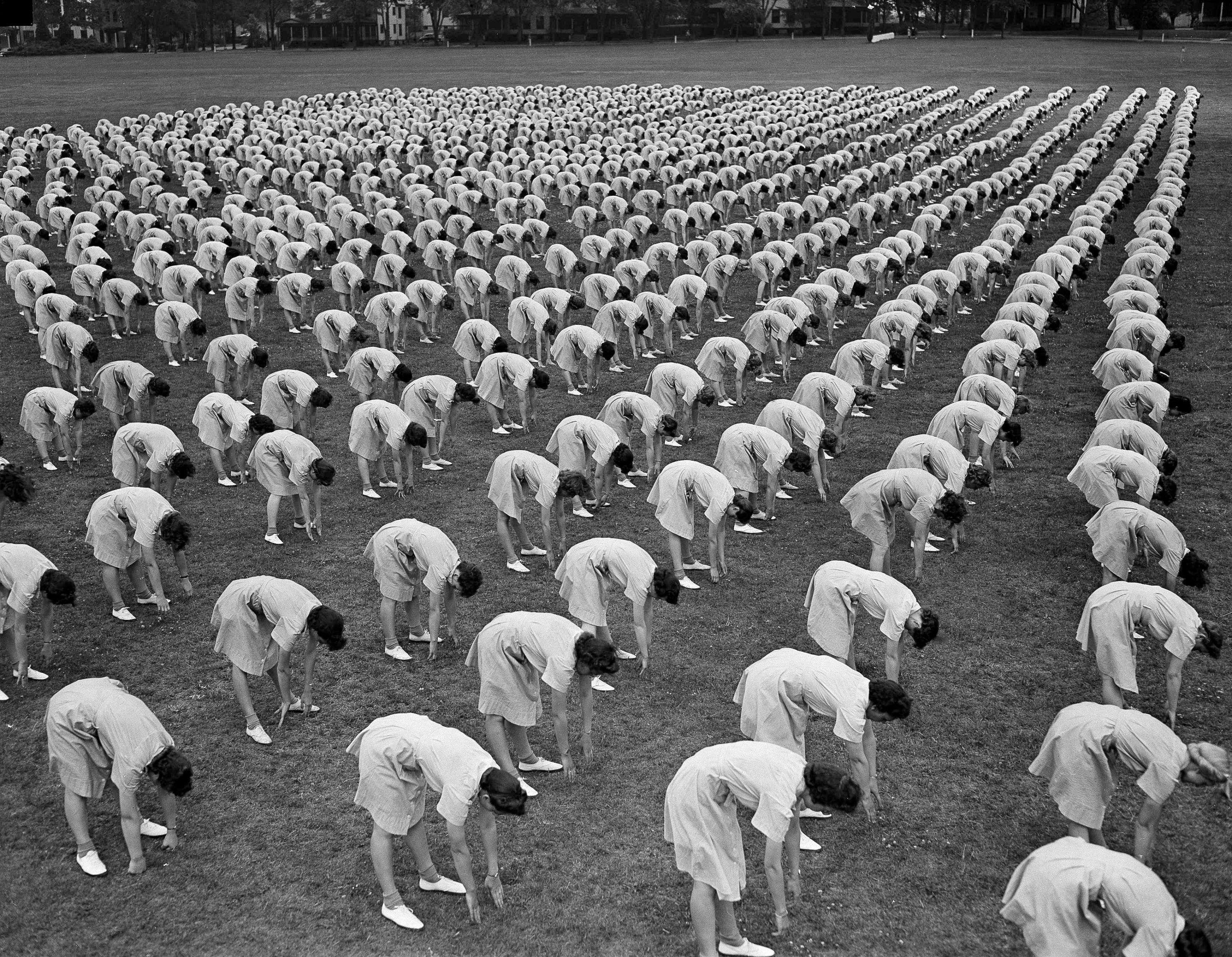 Over 2,000 members of the Women's Army Auxiliary Corps (WAAC) take part in a mass calisthenics exercise, Fort Oglethorpe, Georgia, U.S., May 15, 1943. (AP Photo)