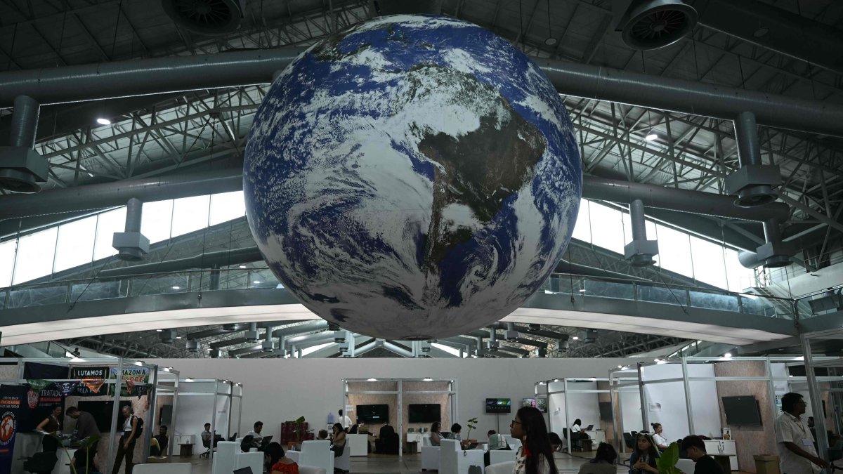 A huge globe representing the earth hangs inside a ward at the COP30 U.N. Climate Change Conference premises, Belem, Brazil, Nov. 10, 2025. (AFP Photo)