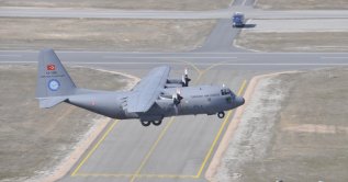 A Turkish C-130 military transportation aircraft seen before landing in the Kahramankazan district, Ankara, Türkiye, Dec. 8, 2020. (Photo by TAI via AA)