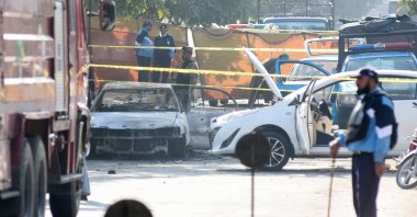 A police officer stands at the site of a blast outside a court building in Islamabad, Pakistan, Nov. 11, 2025. (Reuters Photo)