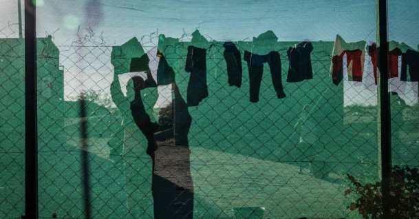 A Sudanese refugee dries laundry at the Tine transit camp in Chad, Nov. 10, 2025. (AFP Photo)