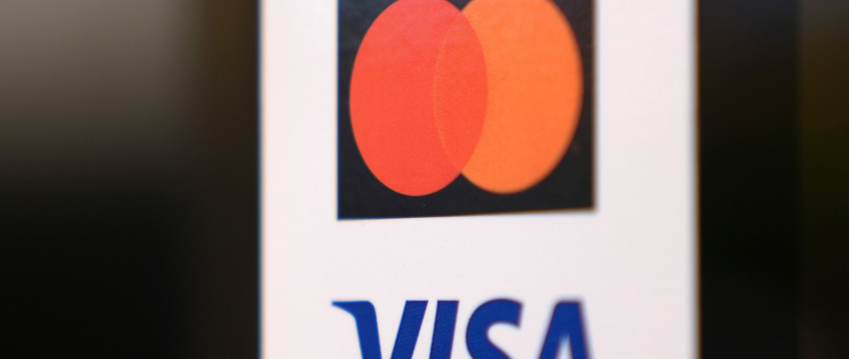The Visa and Mastercard logos are listed at a retail store in Los Angeles, California, U.S., Nov. 10, 2025. (EPA Photo)