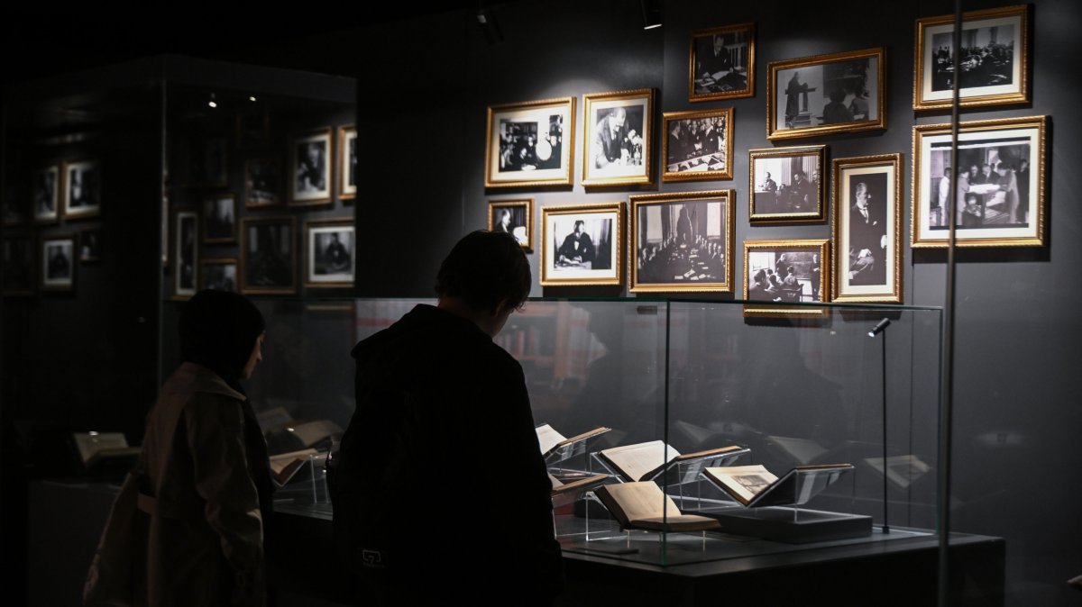 A visitor explores the "Atatürk’s World of Books" exhibition at the Presidential National Library, Ankara, Türkiye, Nov. 10, 2025. (AA Photo)