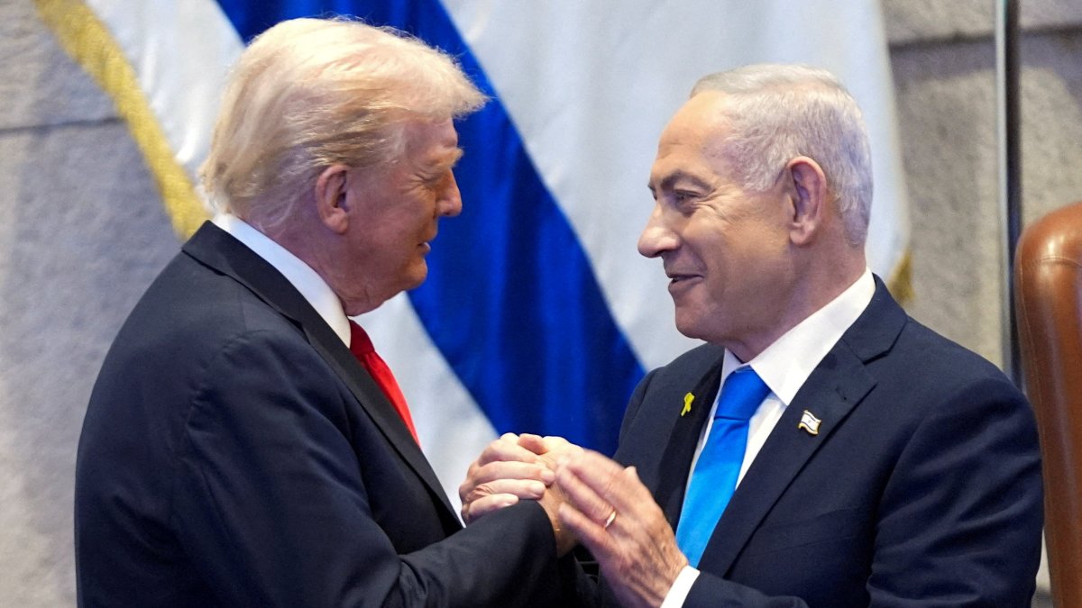 U.S. President Donald Trump talks with Israel's Prime Minister Benjamin Netanyahu at the Knesset, in Jerusalem, Israel, Oct. 13, 2025. (Reuters Photo)
