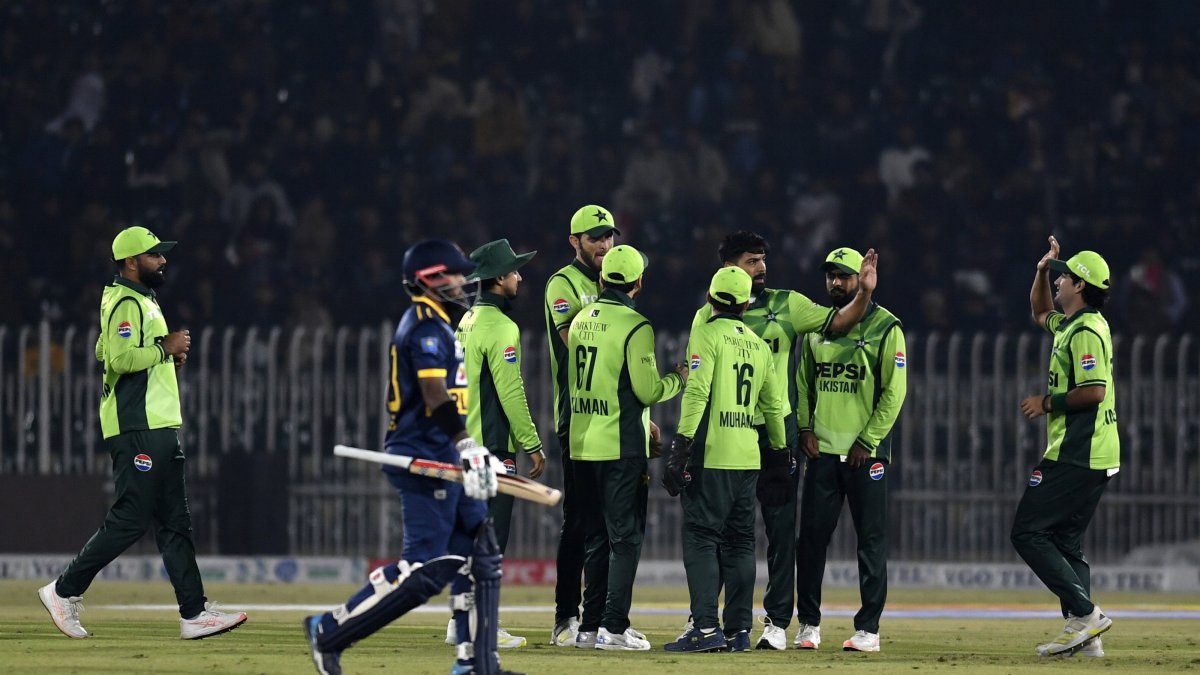 Pakistan players celebrate with teammates after taking the wicket of Sri Lanka's Pathum Nissanka during the first one-day international (ODI) cricket match between Pakistan and Sri Lanka at the Rawalpindi Cricket Stadium, Rawalpindi, Pakistan, Nov. 11, 2025. (EPA Photo)