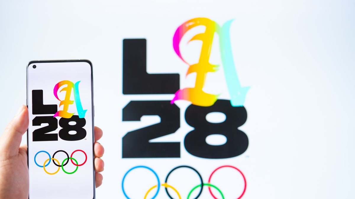 Mobile and monitor of the 2028 Los Angeles Olympic Games logo, Zhongshan, China, July 29, 2024. (Shutterstock Photo)
