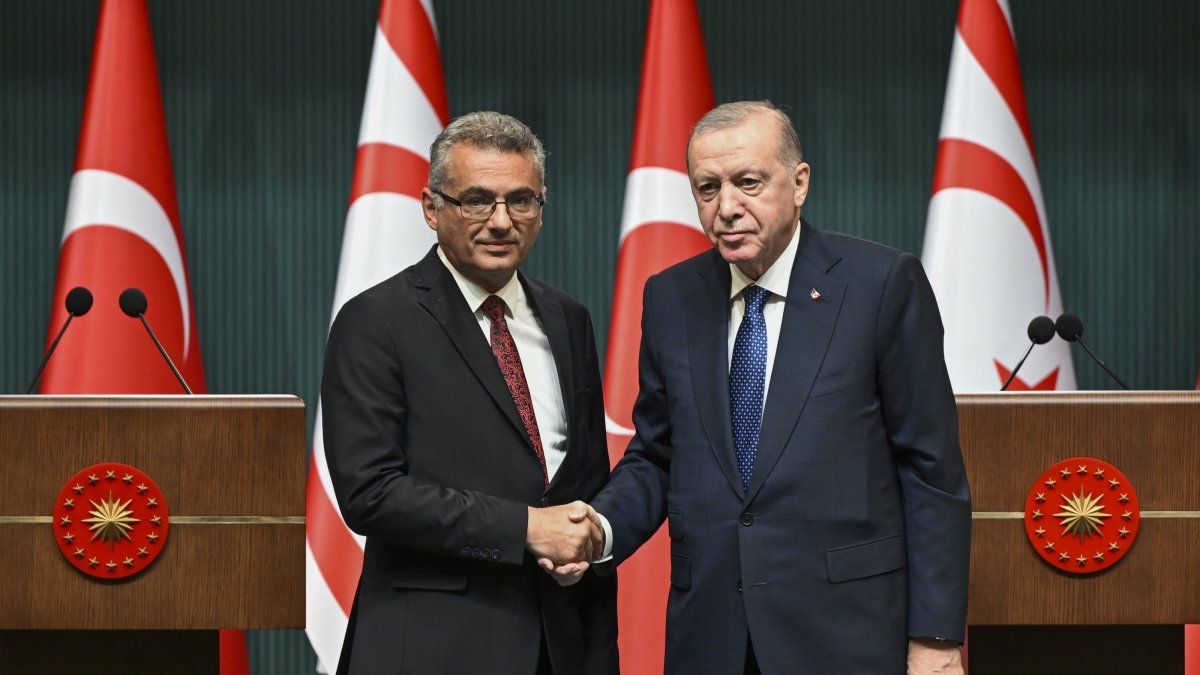 President Recep Tayyip Erdoğan (R) and Tufan Erhürman, the newly elected president of the Turkish Republic of Northern Cyprus (TRNC), shake hands after a joint news conference, Ankara, Türkiye, Nov. 13, 2025. (AA Photo)