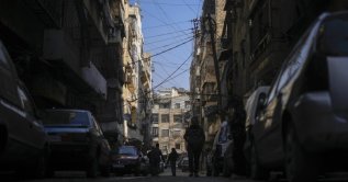 Power cables hang in the streets of Aleppo city, Syria, Jan. 30, 2025. (AP Photo)