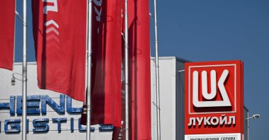 The logo of Russia&#039;s energy giant Lukoil is pictured at a petrol station, Sofia, Bulgaria, Oct. 23, 2025. (AFP Photo)