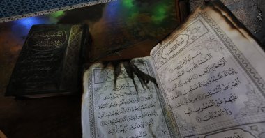 A view of the burned Quran at al-Hajja Hamida Mosque in an attack by Israeli settlers, in Der Estya village, near Salfitt, occupied West Bank, Nov. 13, 2025. (EPA Photo)