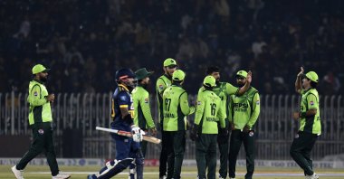 Pakistan players celebrate with teammates after taking the wicket of Sri Lanka&#039;s Pathum Nissanka during the first one-day international (ODI) cricket match between Pakistan and Sri Lanka at the Rawalpindi Cricket Stadium, Rawalpindi, Pakistan, Nov. 11, 2025. (EPA Photo)