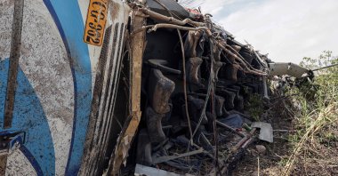 The remains of a bus that plunged into a ravine are seen in Arequipa, Peru, Nov. 12, 2025. (AFP Photo)