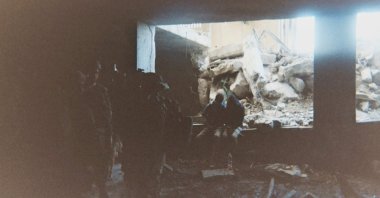 This photo, provided by Breaking the Silence, a whistleblower group of former Israeli soldiers, shows two detainees used as human shields being held inside a house in the Gaza City area in 2024. (AP Photo)